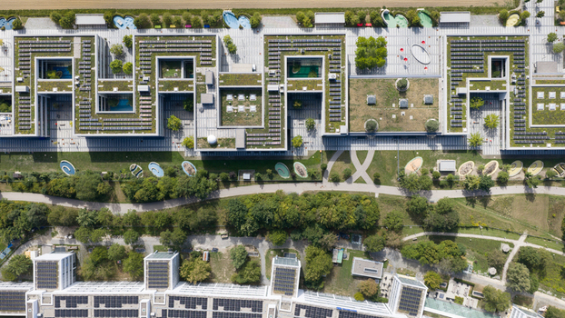 Unterfohring Germany 12 September 2026 Aerial view of the Allianz Commercial headquarters featuring modern architecture with green roofs solar panels and landscaped grounds.