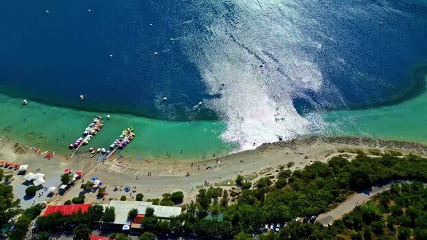Aerial view of the coastline of Crete with pedal boats Greece.