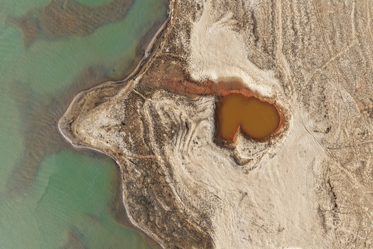 Aerial view of Jadukata River with sandy banks and a small pool of water in Sunamganj Sylhet Division Bangladesh. Aerial view of Jadukata River with sandy banks and a small pool of water in Sunamganj Sylhet Division Bangladesh.