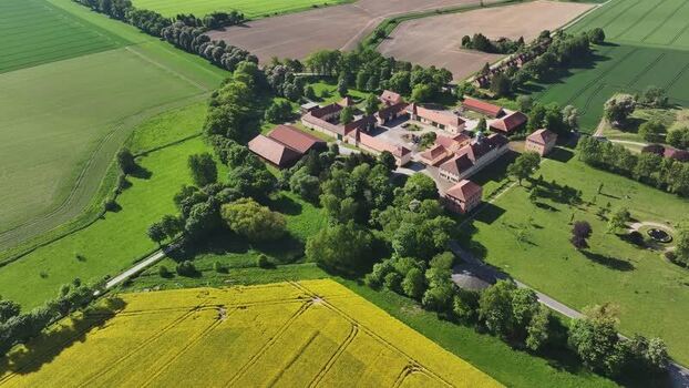 Aerial view of a historic estate and yellow fields Germany. Aerial view of a historic estate and yellow fields Germany.