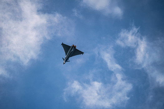 Berlin Germany 13 June 2026 View of a Eurofighter Typhoon performing an aerial display at the ILA Berlin Air Show against a blue sky with scattered clouds. Berlin Germany 13 June 2026 View of a Eurofighter Typhoon performing an aerial display at the ILA Berlin Air Show against a blue sky with scattered clouds.