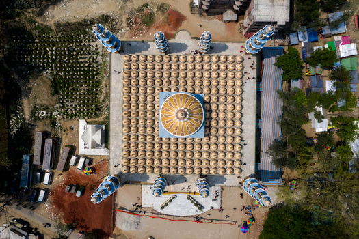 Aerial view of the vibrant Baitul Aman Jame Masjid s intricate dome and minarets contrast sharply with the surrounding structures Tangail Dhaka Division Bangladesh. Aerial view of the vibrant Baitul Aman Jame Masjid s intricate dome and minarets contrast sharply with the surrounding structures Tangail Dhaka Division Bangladesh.