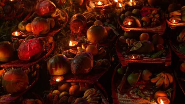 View of traditional religious offerings with lit oil lamps Bangladesh. View of traditional religious offerings with lit oil lamps Bangladesh.
