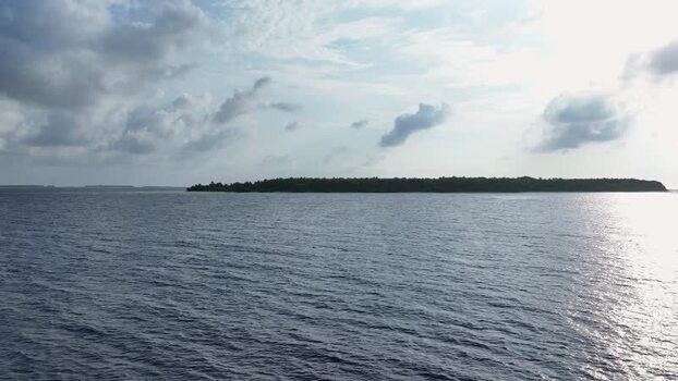 Aerial view of Maalhos island and the deep blue Indian Ocean Maldives. Aerial view of Maalhos island and the deep blue Indian Ocean Maldives.