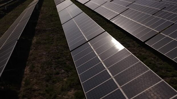 Aerial view of solar panels in a solar farm Portugal. Aerial view of solar panels in a solar farm Portugal.