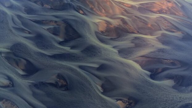 Aerial view of braided glacial river patterns in Iceland. Aerial view of braided glacial river patterns in Iceland.