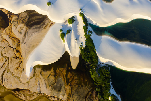Aerial view of Parque Nacional dos Lencois Maranhenses with white sand dunes turquoise lagoons and green vegetation Lencois Maranhenses MA Brazil. Aerial view of Parque Nacional dos Lencois Maranhenses with white sand dunes turquoise lagoons and green vegetation Lencois Maranhenses MA Brazil.