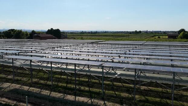 Aerial view of solar farm in the countryside of Italy.