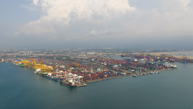 Si Racha District Thailand 08 March 2026 Aerial view of Laem Chabang International Terminal B 5 Terminal with rows of colorful shipping containers industrial cranes and cargo ships. Si Racha District Thailand 08 March 2026 Aerial view of Laem Chabang International Terminal B 5 Terminal with rows of colorful shipping containers industrial cranes and cargo ships.