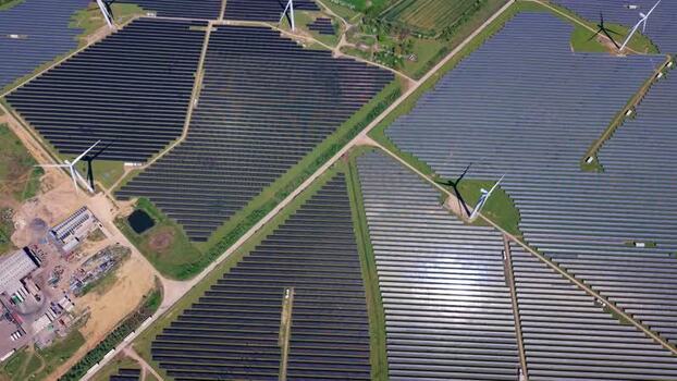 Aerial view of Chelveston Wind Farm and solar panels United Kingdom. Aerial view of Chelveston Wind Farm and solar panels United Kingdom.