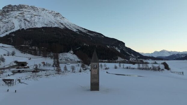 Aerial view of the submerged bell tower in Graun im Vinschgau Italy. Aerial view of the submerged bell tower in Graun im Vinschgau Italy.