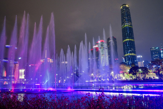 Guangzhou Guangdong Province China 24 February 2024 View of the illuminated musical fountain at night with the iconic Guangzhou International Finance Center and modern skyscrapers. Guangzhou Guangdong Province China 24 February 2024 View of the illuminated musical fountain at night with the iconic Guangzhou International Finance Center and modern skyscrapers.