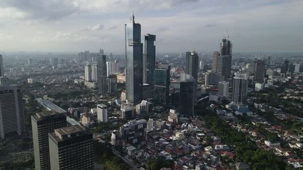 Aerial view of modern skyscrapers in Indonesia. Aerial view of modern skyscrapers in Indonesia.