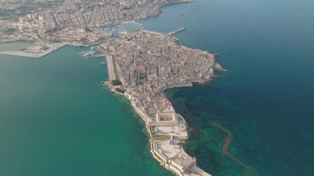 Aerial view of the historic Island of Ortigia and Maniace Castle Italy. Aerial view of the historic Island of Ortigia and Maniace Castle Italy.