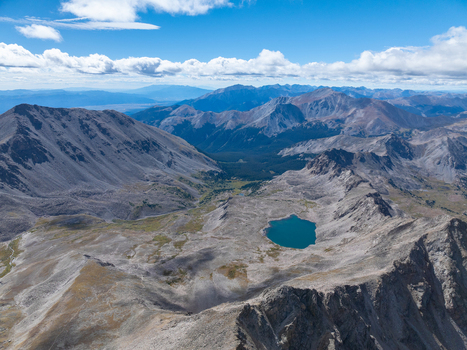 Aerial view of Mount Columbia Mt Yale with its rugged rocky peaks and a vibrant alpine lake nestled in the mountainous landscape of Buena Vista Colorado United States. Aerial view of Mount Columbia Mt Yale with its rugged rocky peaks and a vibrant alpine lake nestled in the mountainous landscape of Buena Vista Colorado United States.