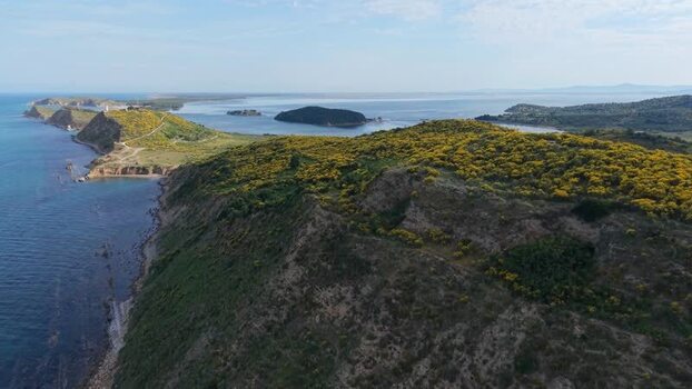 Aerial view of the Zvernec Peninsula and flowering hills Albania. Aerial view of the Zvernec Peninsula and flowering hills Albania.