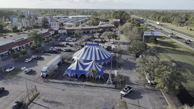 Aerial view of circus tents near outlet mall United States. Aerial view of circus tents near outlet mall United States.
