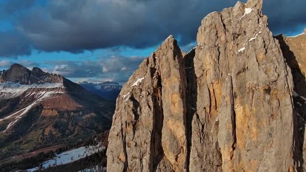 Aerial view of Dolomite Mountains peaks in Canazei Italy.