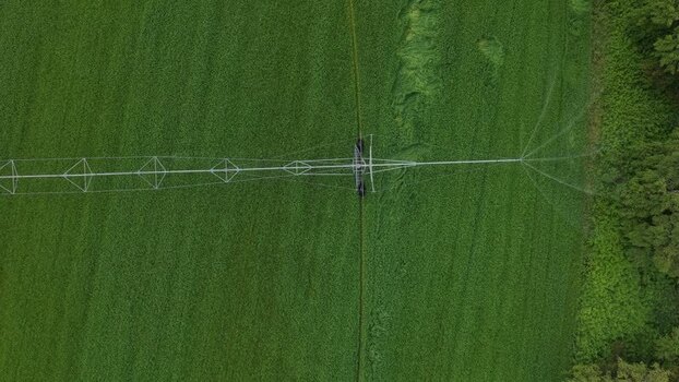 Aerial view of an irrigation system over green fields Portugal.