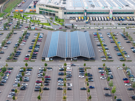 Grunheide Mark Germany 07 September 2026 Aerial view of Tesla Gigafactory Berlin Brandenburg featuring a large solar covered parking lot with numerous cars and the main factory building. Grunheide Mark Germany 07 September 2026 Aerial view of Tesla Gigafactory Berlin Brandenburg featuring a large solar covered parking lot with numerous cars and the main factory building.