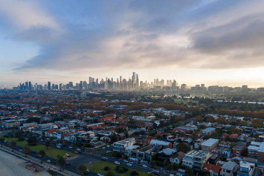 Aerial view of the Melbourne skyline at sunrise featuring suburbs of St Kilda West and Middle Park in the foreground Victoria Australia. Aerial view of the Melbourne skyline at sunrise featuring suburbs of St Kilda West and Middle Park in the foreground Victoria Australia.
