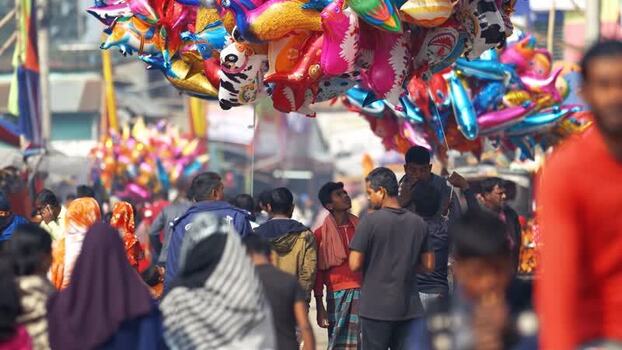 View of people and colorful balloons in a crowded street Bangladesh. View of people and colorful balloons in a crowded street Bangladesh.