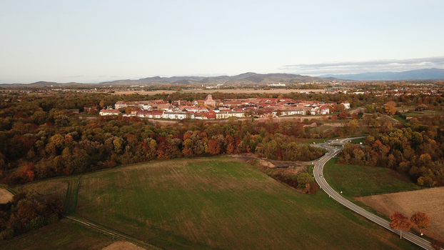 Aerial view of the Vauban walled city of Neuf Brisach surrounded by autumn forests and fields in Neuf Brisach Grand Est France. Aerial view of the Vauban walled city of Neuf Brisach surrounded by autumn forests and fields in Neuf Brisach Grand Est France.