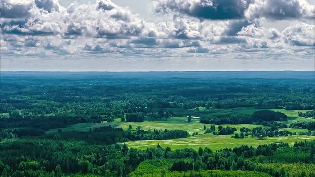 Aerial view of lush forests and meadows in Latvia. Aerial view of lush forests and meadows in Latvia.