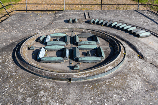 View of the bronze scale model of the Viking fortress Trelleborg featuring the circular rampart and longhouses in Slagelse Sjaelland Denmark. View of the bronze scale model of the Viking fortress Trelleborg featuring the circular rampart and longhouses in Slagelse Sjaelland Denmark.