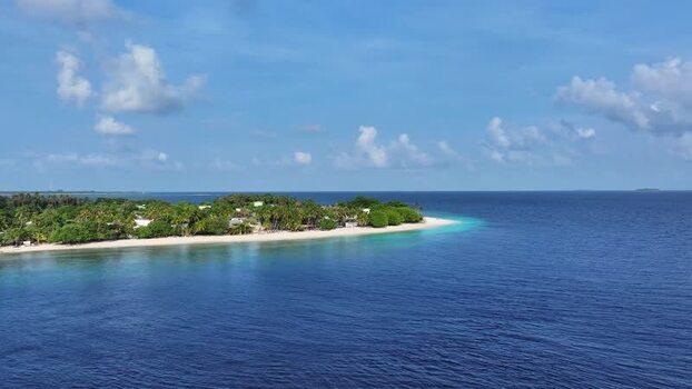 Aerial view of the tropical island of Maalhos and turquoise waters Maldives. Aerial view of the tropical island of Maalhos and turquoise waters Maldives.