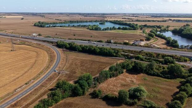 Aerial view of A1 motorway traffic in Huntingdon United Kingdom. Aerial view of A1 motorway traffic in Huntingdon United Kingdom.