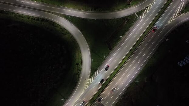 Aerial view of roads and cars at night Portugal.