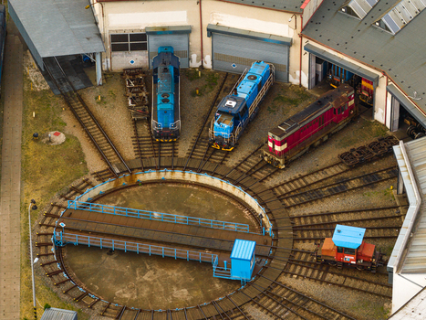 Aerial view of a railway turntable with several locomotives parked in a depot area in Breclav South Moravian Region Czechia.