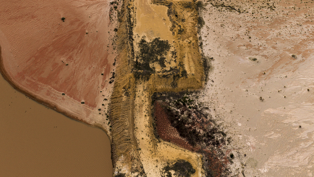 Aerial view of the salt lakes and industrial mining patterns near Kalbarri showcasing contrasting colors of sand salt and water in Kalbarri Western Australia Australia. Aerial view of the salt lakes and industrial mining patterns near Kalbarri showcasing contrasting colors of sand salt and water in Kalbarri Western Australia Australia.