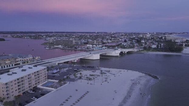 Aerial view of John s Pass Bridge and boardwalk at dusk United States. Aerial view of John s Pass Bridge and boardwalk at dusk United States.