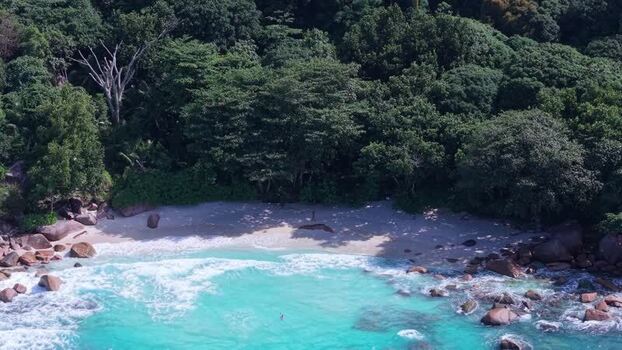 Aerial view of Anse Lazio beach with turquoise water Seychelles.