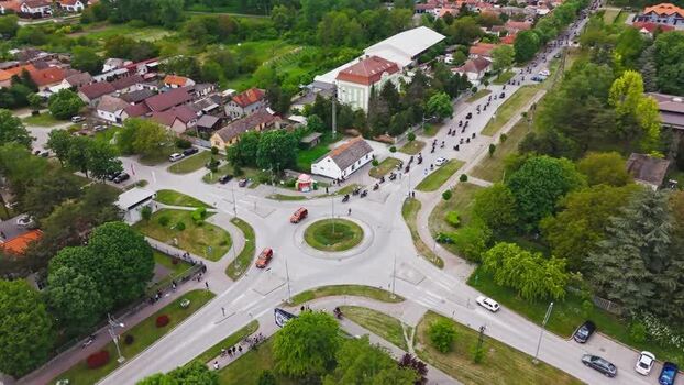 Aerial view of motorcycle procession at roundabout Serbia. Aerial view of motorcycle procession at roundabout Serbia.