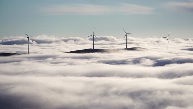View of wind turbines above clouds in the Balkan Mountains Bulgaria.