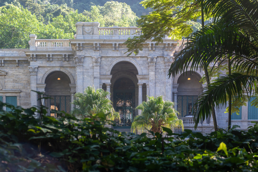 Rio de Janeiro Brazil 09 June 2026 View of the historic mansion at Parque Lage with its stone arches and classical architecture surrounded by lush tropical vegetation.