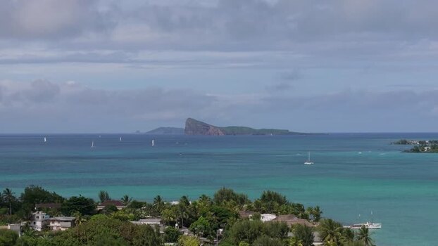 Aerial view of Grand Baie Public Beach and turquoise waters Mauritius.