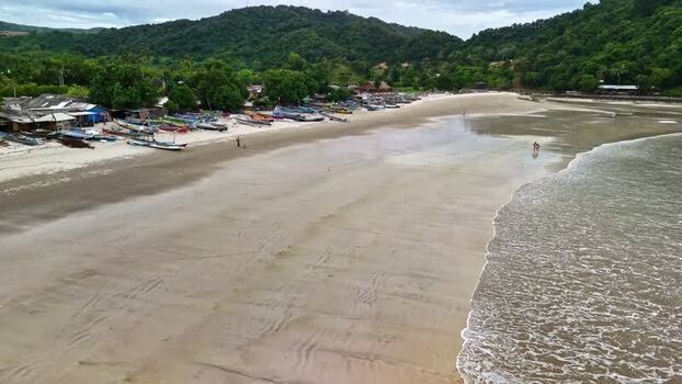 Aerial view of fishing boats on a beach in Bali Indonesia.