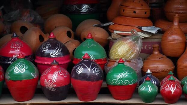 View of colorful painted clay pots in a market in Bogura Bangladesh. View of colorful painted clay pots in a market in Bogura Bangladesh.