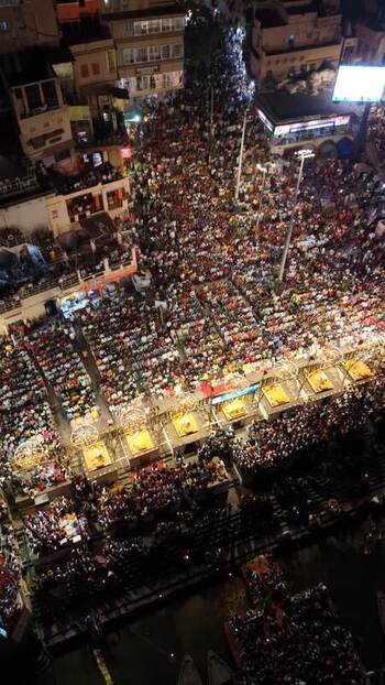 Aerial view of a large crowd at Dashashwamedh Ghat at night India. Aerial view of a large crowd at Dashashwamedh Ghat at night India.