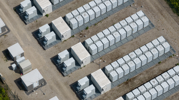 Wanneperveen Netherlands 23 May 2026 Aerial view of rows of white battery storage units at a large scale energy storage facility on a gravel site. Wanneperveen Netherlands 23 May 2026 Aerial view of rows of white battery storage units at a large scale energy storage facility on a gravel site.
