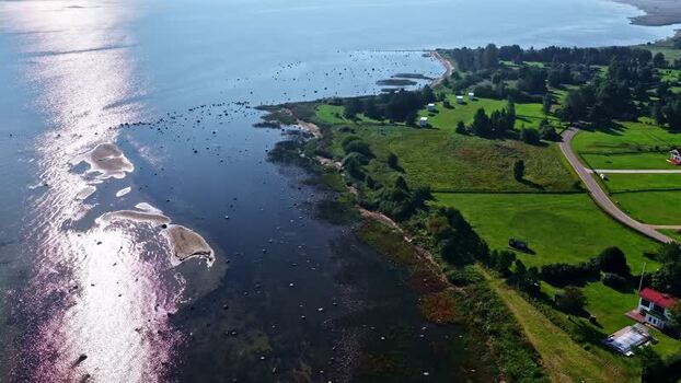 Aerial view of the Latvian coastline with green fields Latvia. Aerial view of the Latvian coastline with green fields Latvia.