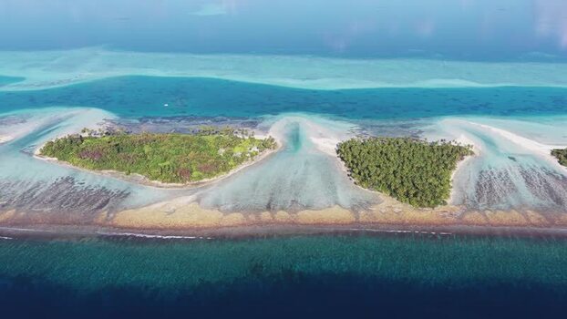 Aerial view of tropical islands and coral reefs Maldives.