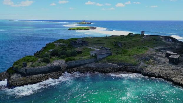 Aerial view of historic fort on rocky island in Mauritius.