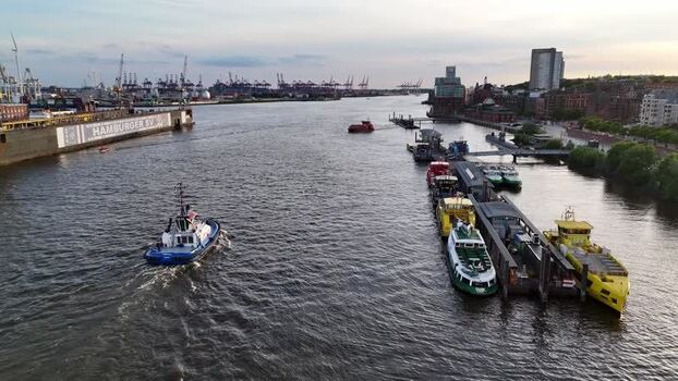 Aerial view of a tugboat on the Elbe river in Hamburg Germany.