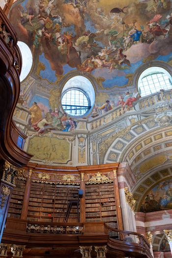 Vienna Austria 26 April 2026 View of the Austrian National Library featuring the frescoed dome ornate wooden bookshelves and golden baroque decorations in the State Hall. Vienna Austria 26 April 2026 View of the Austrian National Library featuring the frescoed dome ornate wooden bookshelves and golden baroque decorations in the State Hall.