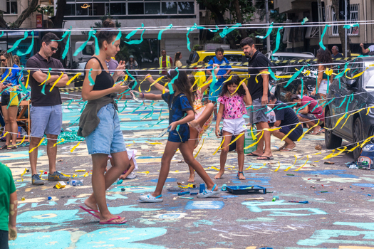 Rio de Janeiro Brazil 13 June 2026 View of people and children celebrating in a street decorated with green and yellow ribbons for the World Cup 2026.